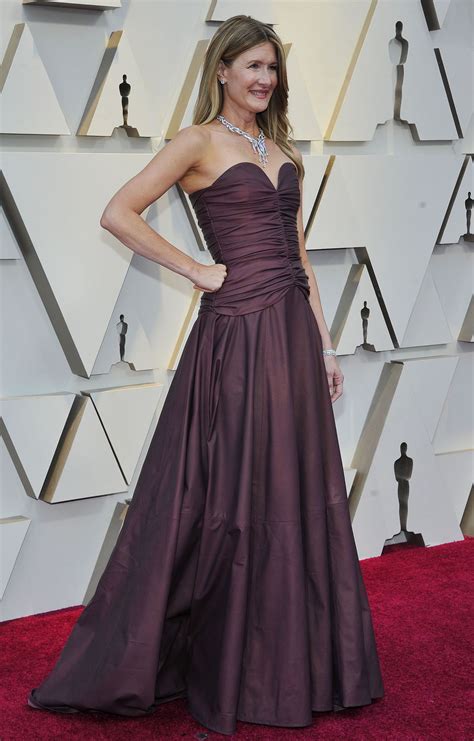 The pair cuddled up on the red carpet with. Laura Dern - Oscars 2019 Red Carpet