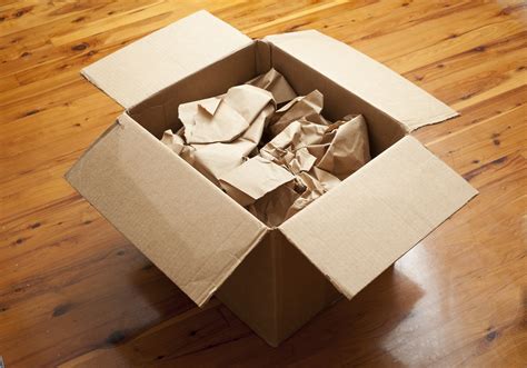 Open Cardboard Box With Brown Paper 9439 Stockarch Free Stock Photo