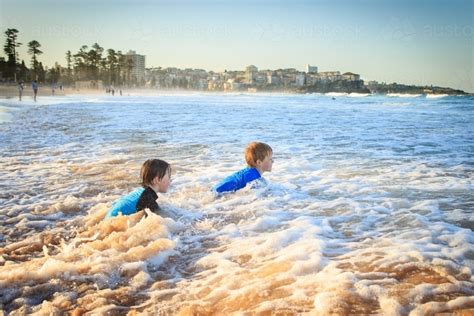 Image Of Kids Swimming At The Beach Manly Sydney Australia