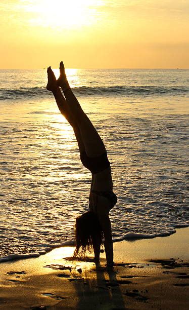 Girl Handstand Silhouette Stock Photos Pictures And Royalty Free Images