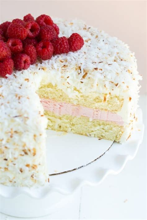 Coconut Cake With Marshmallow Frosting And Raspberry Buttercream