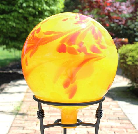 Glass Gazing Ball Yelloworange 12 Inch Iron Elegance