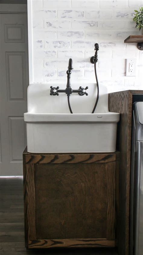 Also, the perfect farmhouse sink is in a trough shape and is designed with copper hardware. DIY Farmhouse Sink Cabinet for Laundry Room in 2020 (With ...