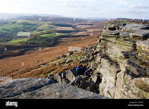 Rock Climbers On The Top Of Stanage Edge In The Peak District National