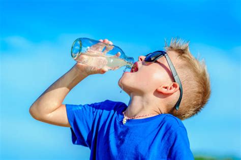 1700 Thirsty Boy Drinking Water Stock Photos Pictures And Royalty Free