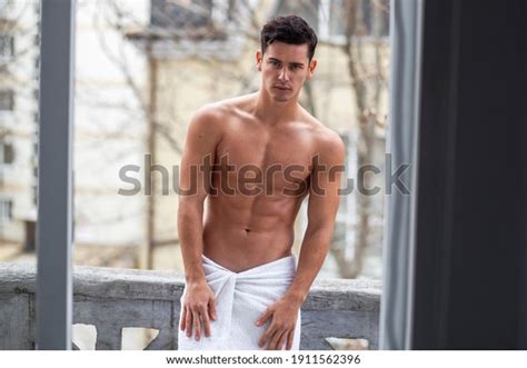 Shirtless Athlete Handsome Man Poses On Balcony With Naked Torso In Outside
