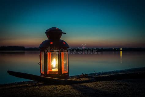 Lantern On The Beach At The Lake Stock Photo Image Of Clouds Idyllic