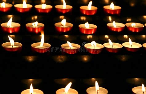 Many Candles Lit Inside The Place Of Worship To Pray Stock Image