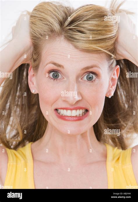 Frustrated Woman Pulling On Hair Stock Photo Alamy