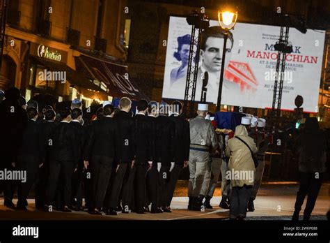 French soldiers hold the coffins during the induction ceremony of