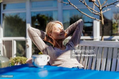 mature sunbathing photos and premium high res pictures getty images