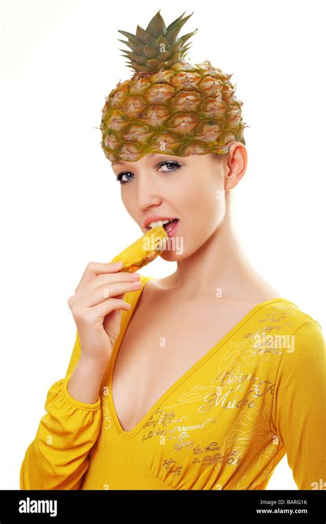 Young Woman with Pineapple on Her Head Stock Photo - Alamy