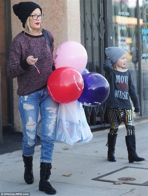 Tori Spelling And Daughter Stella Wear Matching Beanies For Day Of