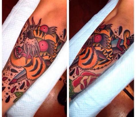 New School Dagger Stabbed Tiger Tattoo By Chopstick Tattoo