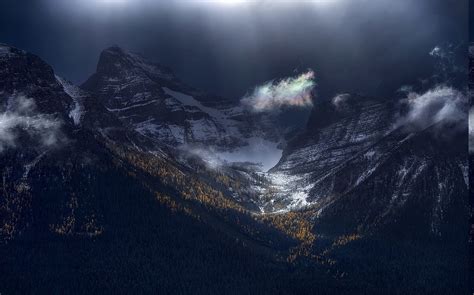 1230x768 Nature Landscape Mountain Forest Sun Rays Snowy Peak Banff