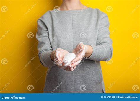 Woman Holds And Shows Soap In Her Hands Palms And Fingers In Soapy Foam Stretch The Soap