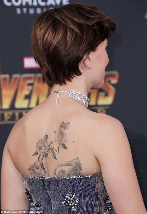 Comicbook.com reports, the tattoo appears to be a series of roses. Scarlett Johansson flaunts back tattoo at Avengers ...