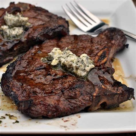 I pan fried the steaks in a grill pan about 8 minutes each side and then put 1/2 a tablespoon of butter on top to melt when done. Marinated Herb Butter T Bone Steaks | Small Town Woman