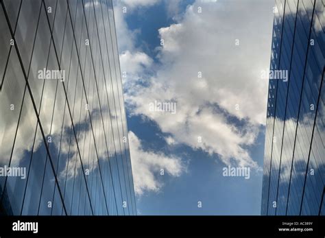 Glass Office Building Windows And Clouds In The Sky Stock Photo Alamy