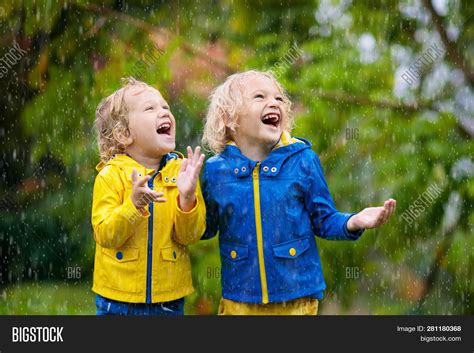 Kids Play Autumn Rain Image And Photo Free Trial Bigstock
