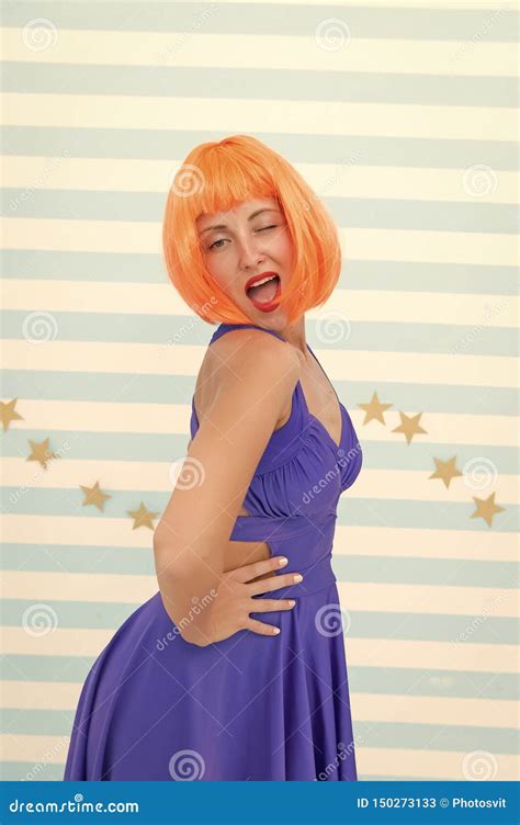 Crazy Girl Winking Girl With Orange Hair And Crazy Look Fashion Model