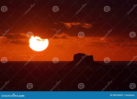 Sunset Through The Clouds With Filfla In The Foreground Stock Image