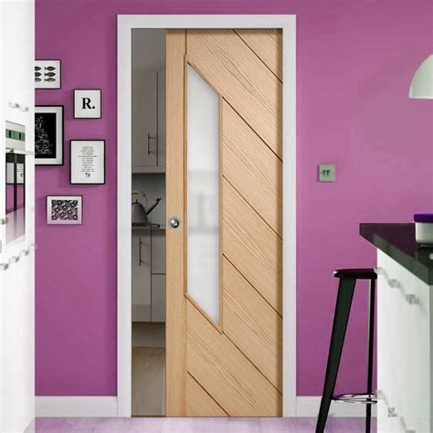 First, a design is drawn up single, double, glass and fire rated pocket sliding door kits suitable for uk homes. Monza Oak Single Evokit Pocket Door Glazed - Frosted Glass ...
