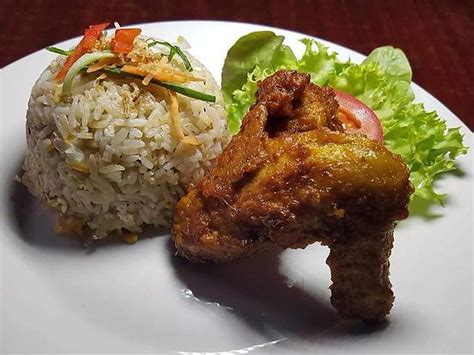Ayam goreng is an indonesian and malaysian dish consisting of chicken deep fried in oil. Nasi Ayam Goreng Berempah - Picture of Malaysian Chapter ...