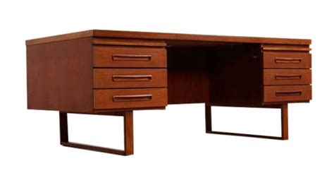With a bank of four drawers and a long drawer across the top, each with a horizontal ledge with a slim oval cutout. Superb Mid Century Modern Danish Teak Executive Desk ...