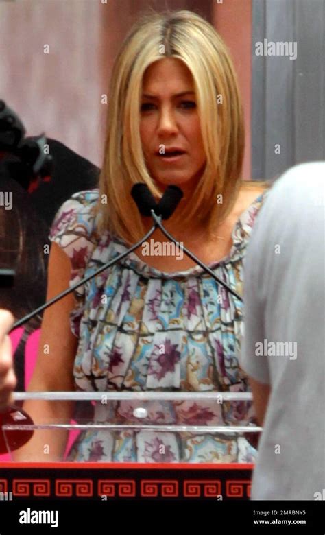 actress jennifer aniston being honored with a hand and footprint ceremony at grauman s chinese