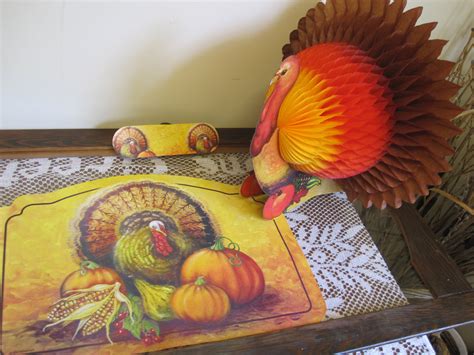 A Turkey Placemat And Napkin Holder On A Table