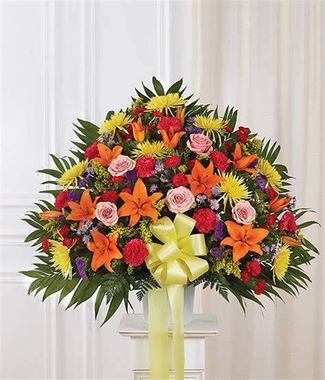 A flower delivery for funeral gatherings should be a reflection of your respect and love for the dearly departed. Multicolor Floral Sympathy Standing Basket at From You Flowers