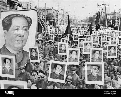 Crowds Holding Posters Of Chinas Communist Party Leader Mao Zedong