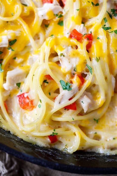 Stir in soup, jalapeños, cubed velveeta and diced tomatoes with green chilies. Chicken Spaghetti - BEST Chicken Spaghetti Casserole ...