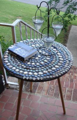 Pier i imports has some attractive outdoor tables with mosaic tops. I'd love to have mosaic tables- I just love mosaics ...