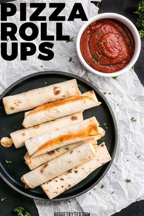 Shredded chicken, stringy cheese and a savory bursting with flavor homemade sauce. Forget frozen pizza rolls! These Pizza Roll Ups are the ...