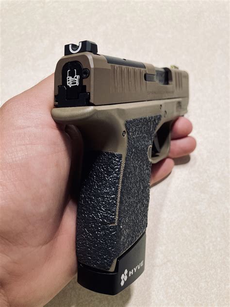 Custom engraving and mag extension for Hellcat from Hyve Technologies