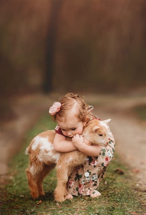 Adorable Children With Baby Animal Photos Showcase Sweet Bonds