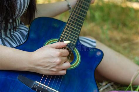 Young Girl Playing Guitar Young Woman With Blue Guitar Stock Photo