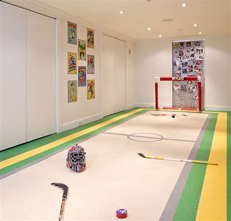 Storing hockey equipment in your kid's bedroom is gross btw. Basement playroom for an ice hockey fan - Decoist