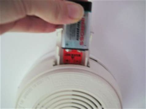 Plug in the plug rotate clockwise to install. How to change a battery in a smoke alarm. All smoke alarms ...