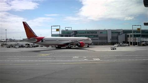 Air India Boeing 777 And Jfk Control Tower At Jfk Terminal 4 By
