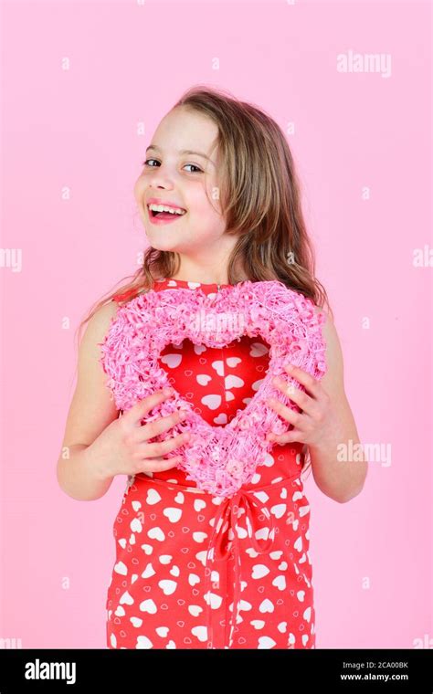 Happy Girl Holding Rosy Heart On Pink Background Valentine And