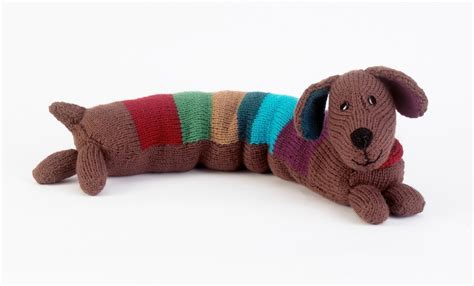 This dog sweater knitting pattern is knit flat, in one piece on straight needles. Stripy Sausage Dog · Extract from Knitted Dogs and Puppies ...