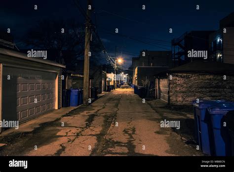 Dark And Eerie Urban City Alley At Night Stock Photo Alamy