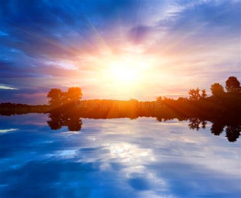 2425 Calm Sunset Over Lake Surface Stock Photos Free And Royalty Free