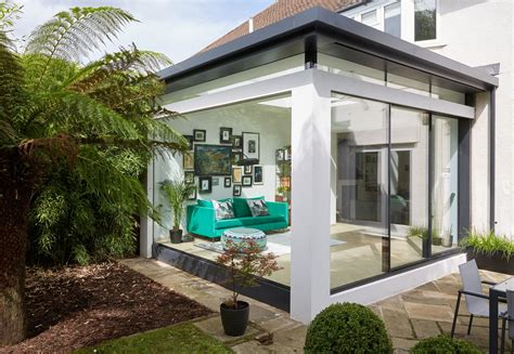 Garden Room Extension With A Picture Frame Glass Window Slimline Sliding Doors And A Flat Roof