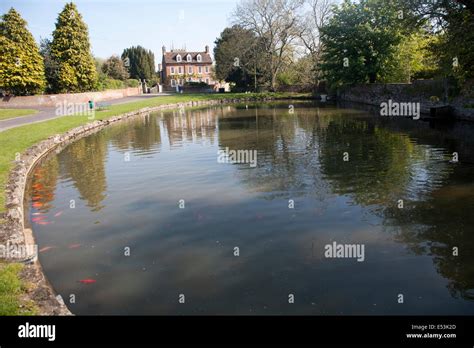 Village Duck Pond And Historic House Urchfont Wiltshire England Stock