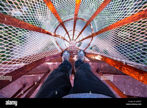 Pov Looking Down A Rusted Old Ladder On A Water Tower Stock Photo Alamy