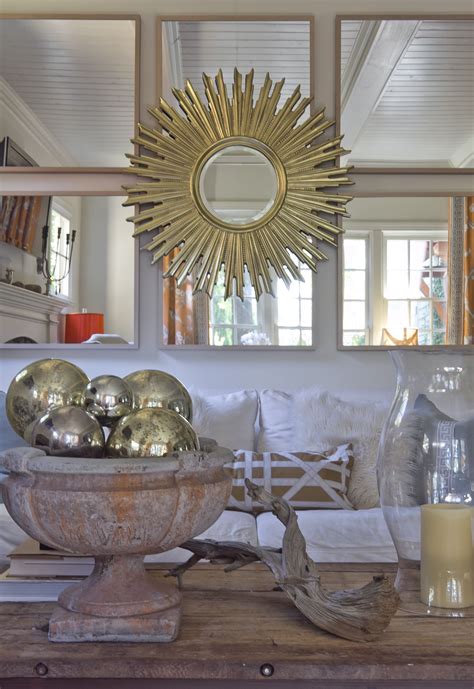 mirror gallery with sunburst behind sofa | Sunburst mirror, Interior design, Wall decor living room